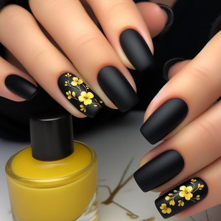 Dramatic Contrast: Yellow Flowers Popping on Black Nails