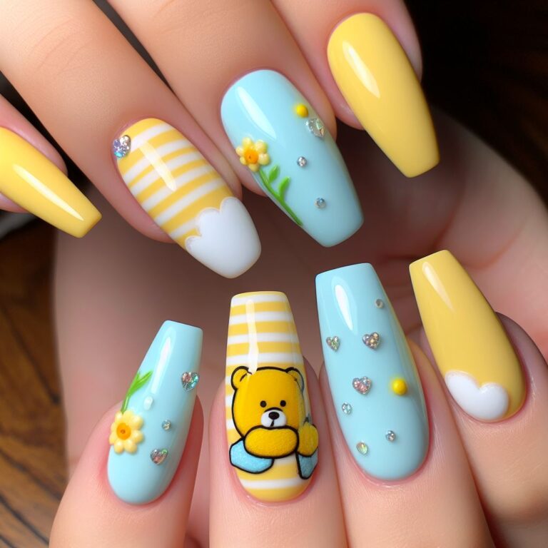 Bear-y Cute Nails: Adorable Blue and Yellow Nail Design with Flowers and Crystals