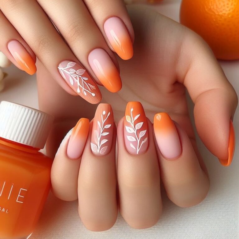 Sun-Kissed Branches: Orange Ombré Nail Art Adorned with White Twig and Leaf Details