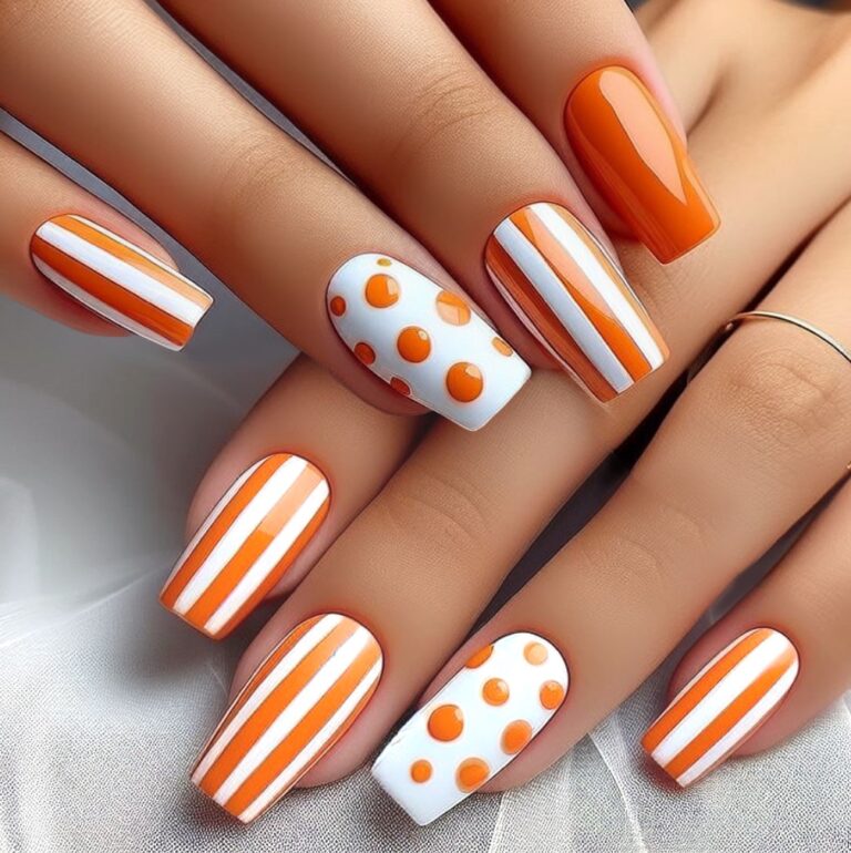 Citrus Fusion: Orange and White Nail Art Featuring Lines and Dots