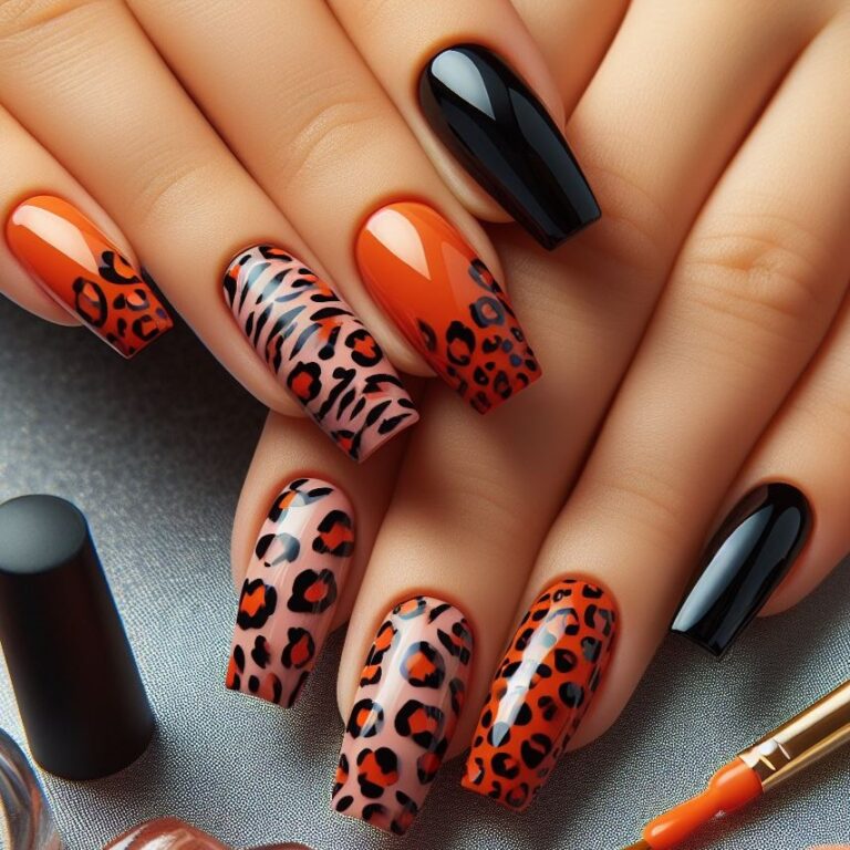 Fierce Feline: Black and Orange Leopard Print Nail Inspiration