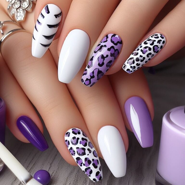Wild Elegance: Purple and White Nail Design with Animal Print Accents